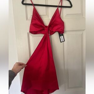 White Fox. Small red “Let’s Run Away Mini Dress”.